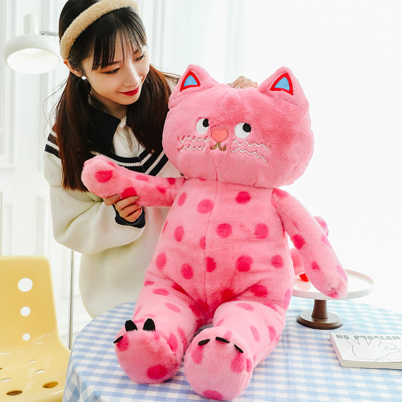 Adorable and Huggable Stuffed Kitty with a Fun Polka Dot Pattern